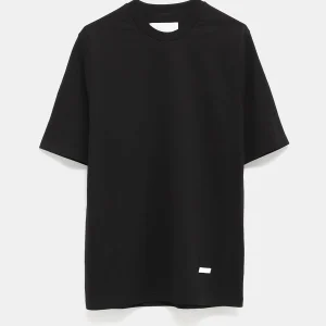 Camiseta con placa metálica