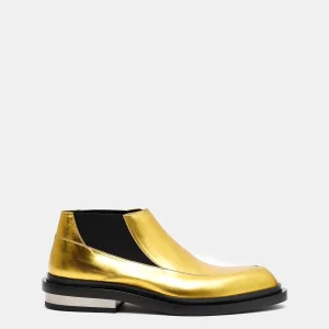 Botín dorado con tacón de metal