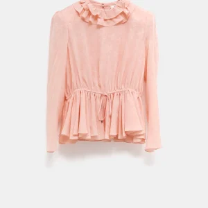 Top fluido con mangas abullonadas