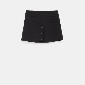 Minifalda en tweed con botones